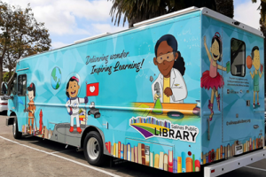 Bookmobile with cartoon images of kids engaging in learning activities