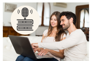 A man and women sitting down and looking at a computer together with an icon of a microphone on top of books to the left