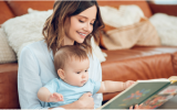 Parent reading to baby.