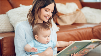 Parent reading to baby.